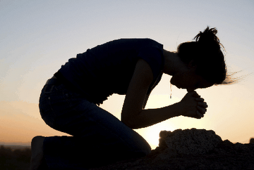praying on knees